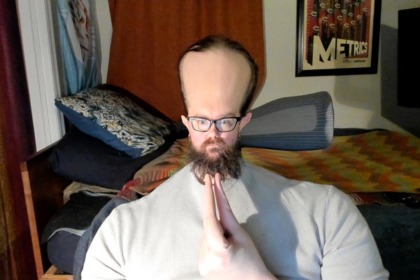 77-bearded-man-glasses-webcam-portrait.jpg